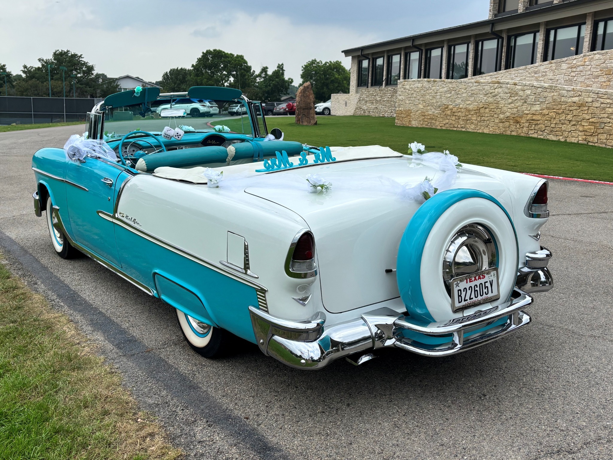 Rear view of Ole' Belle showing her white-and-turquoise Continental Kit