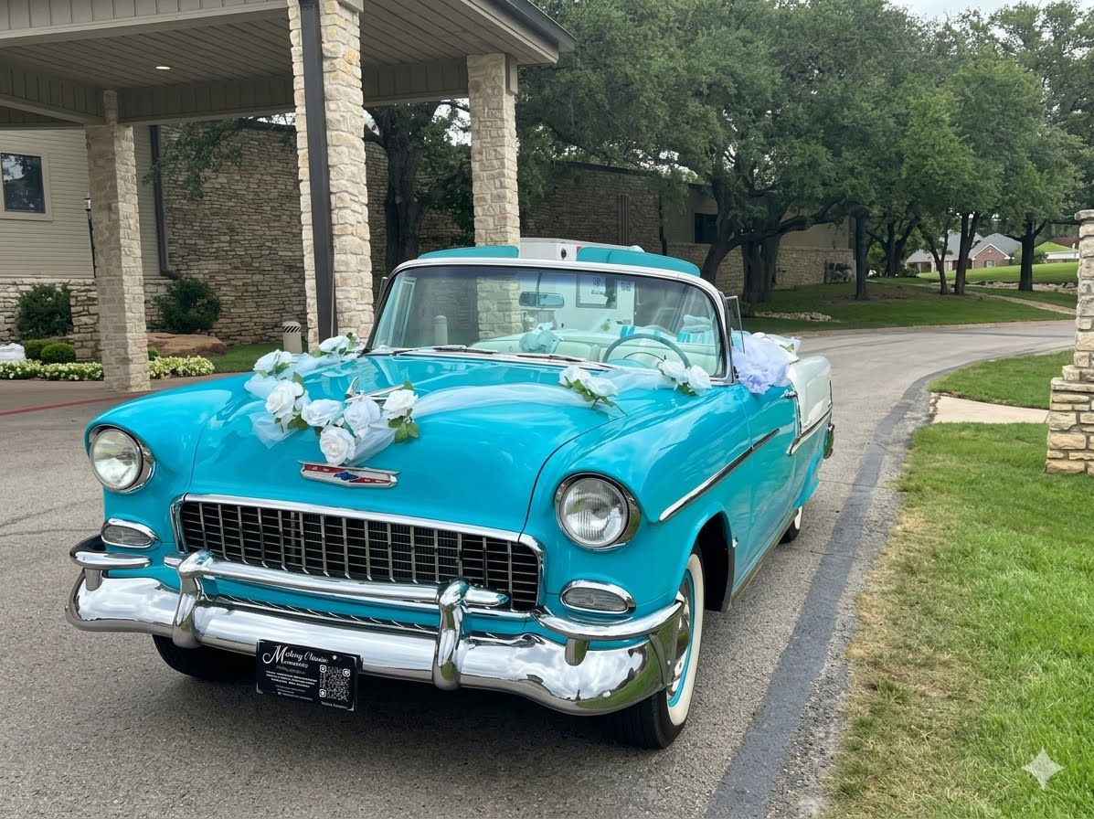 Ole' Belle decorated in white flowers and ribbon, viewed from the front corner